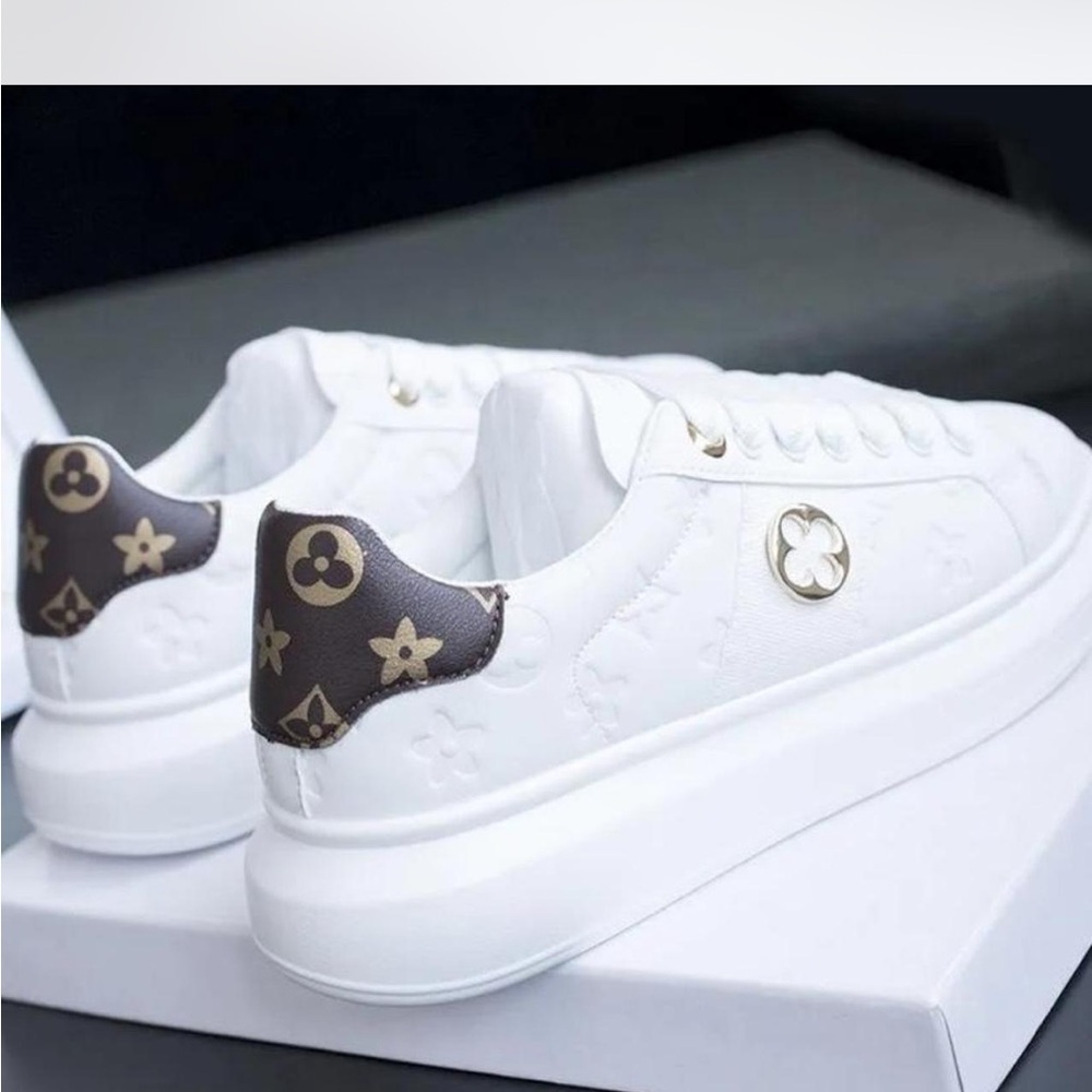 Elegant White Women's Sneakers with Designer Accents